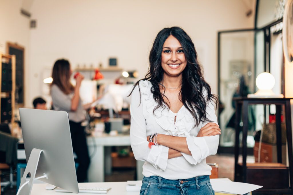 A business owner in a boutique.